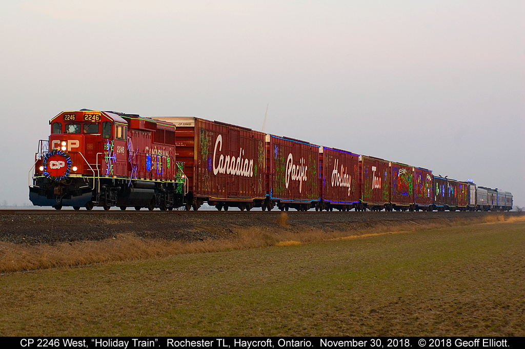 CP's Holiday train is running a little behind as it approaches the Rochester Town Line, just east of St. Joachim, Ontario on December 1, 2018.  The sun had just ducked behind the clouds so that you can see the lights on the train.  Looked good, and my kids loved seeing it again this year.