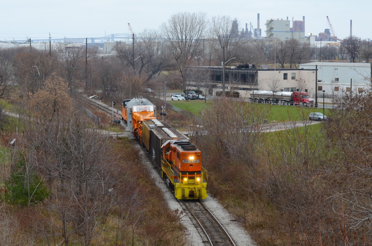 Along with some other people, I managed to get some shots of SOR moving a Hydro One dimensional to the CN Hamilton yard where it will be interchanged with CN then eventually taken to Pickering. RLHH 2081 is leading long hood forward with many crew members on board this load.
