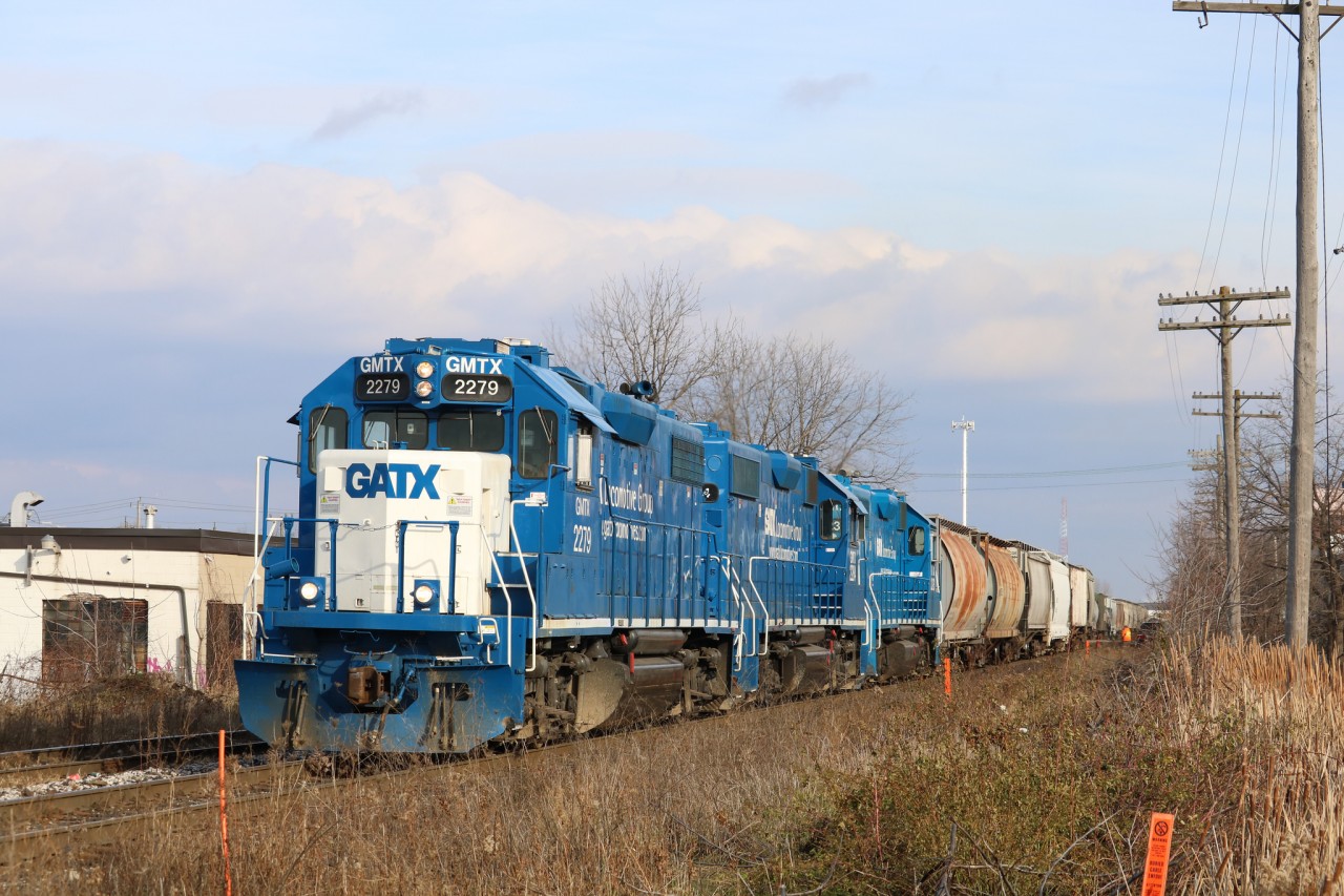 L540 is seen switching Kitchener yard with a trio of GMTX units.