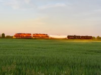 The sun quickly begins to set on the night of the Summer Solstice  as GEXR 584 slowly makes its way towards St Jacobs with three tank cars destined for Elmira. Time was 20:49