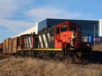 It is certainly not a sight to be taken for granted as we are only a couple weeks away from 2019. I can’t imagine anyone in charge of purchasing locative back in the 1950 would have ever invisioned this pair working for their original owner so many decades later. Granted they have been rebuilt and seen overhauls since they rolled off the assembly line in London, Ontario. Today’s local 551 has just finished working the old Glass lead at Milton, and is now pulling forward to grab a cut of hoppers before heading back to the mainline. The old glass plant once sat on the land where the new industry sits behind the train. It was closed and demolished several years ago when the business moved to Mexico.