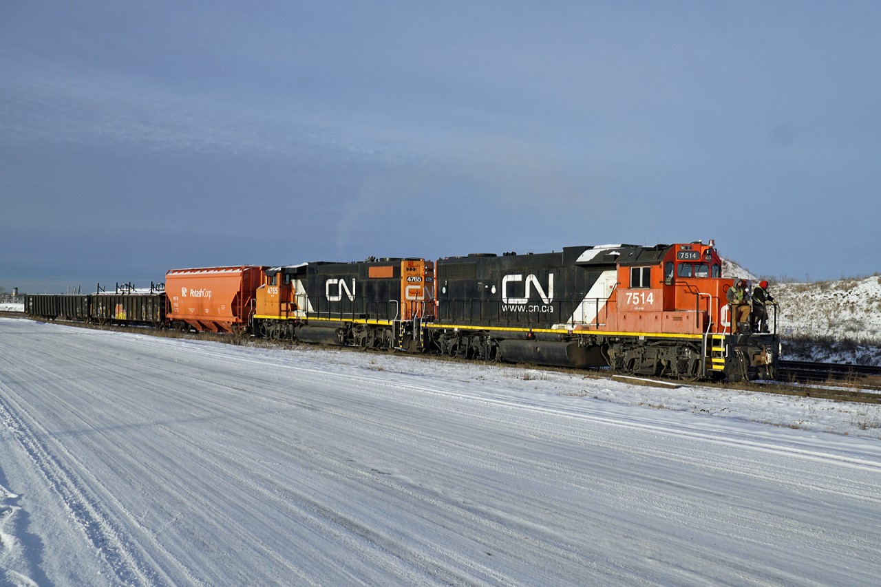 GP 38-2 CN 7514 and GP 38-2(W) CN 4765 bring 3 cars off the Camrose Sub and into Clover Bar Yard.