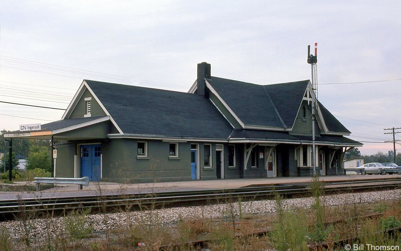 CN's Ingersoll Station is pictured still in use in October of 1977. It was originally built by the Great Western Railway in 1886, and was closed in 1979 when VIA took over passenger operations. It is presently boarded up and in a state of disrepair (not being designated a heritage structure under the Ontario Heritage Act).