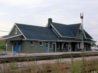 CN's Ingersoll Station is pictured still in use in October of 1977. It was originally built by the Great Western Railway in 1886, and was closed in 1979 when VIA took over passenger operations. It is presently boarded up and in a state of disrepair (not being designated a heritage structure under the Ontario Heritage Act).