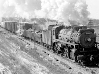 CPR P2f-class 2-8-2 Mikado 5402 heads a freight eastbound through Cooksville on the Galt Sub in 1958.