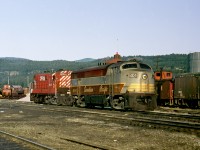 During the era of FM power in the Kootenay's, a C-Liner and an H-Liner sit on the roundhouse lead in front of the station 