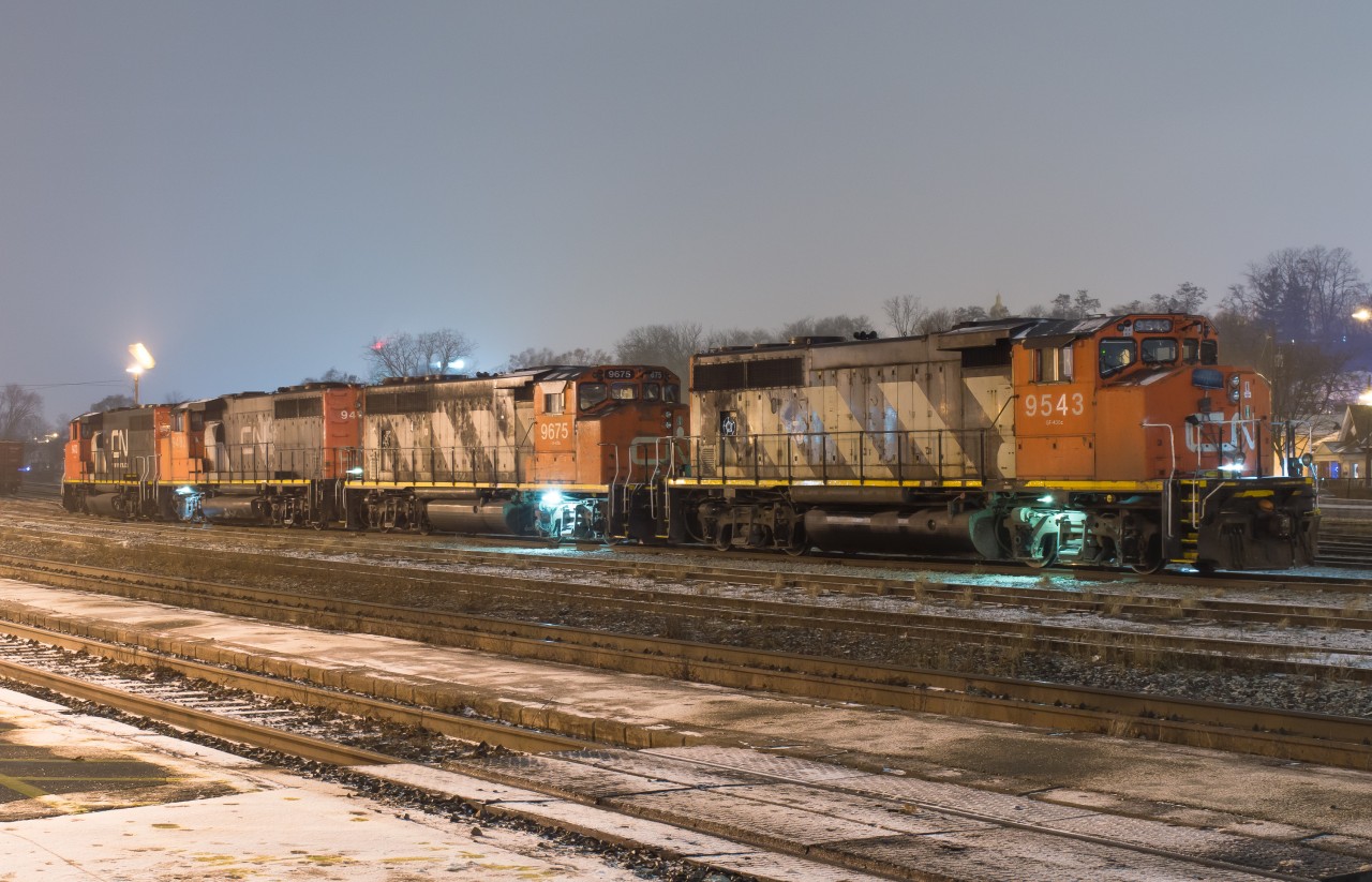 After viewing one of Arnold Mooney's most recent submissions of 4 GP40-2W's descending the Niagara Escarpment, I thought it would be cool to see that many GP40-2W's together again.  For a few short days CN L581 and CN L580 out of Brantford ran with 4 GP40-2W's.  My only chance was to photograph them in the yard at Brantford but I was happy with that.  Pictured CN 9543, CN 9675, CN 9482. CN 9473.