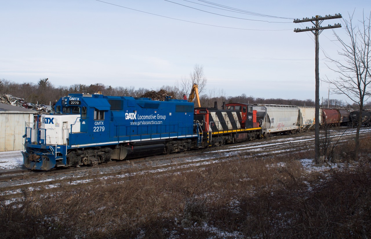 CN L568 is building their train at Kitchener Yard to take to Stratford with GMTX 2279 and CN 1444.
