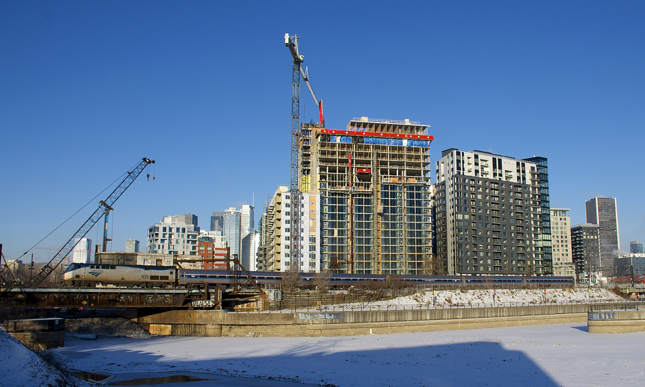 AMTK 109 pushes five Amfleet Cars towards Central Station in Montreal eighty minutes before the Adirondack is scheduled to depart from there.