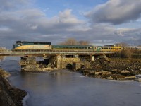 VIA 67 with VIA 6408 and 4 LRC cars heads over the Lachine canal, on its way to its final destination of Toronto. Formerly leaving Central Station at 1545, a recent schedule change has it leaving at 1435 now. 