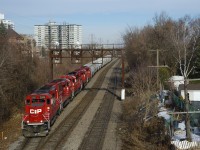 After some rain and some above freezing weather nearly all the snow is gone in Montreal, as CP F94 ducks under a vintage signal bridge with five GP20C-ECO's (CP 2285, CP 2280, CP 2304, CP 2262 & CP 2307) and a shorter than usual train.