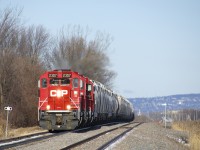 With Mount Royal in the background, CP F94 is passing the St-Mathieu siding, where it will set off its cement cars before heading south to Napierville with two tank cars. Power is a trio of GP20C-ECO's (CP 2307, CP 2253 & CP 2257).