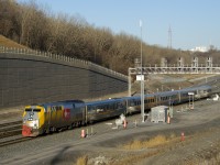 The nose of P42DC VIA 903 had some kind of encounter with brightly colored paint, here it is seen leading VIA 635 by Turcot Ouest.