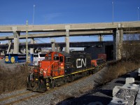 The Pointe St-Charles switcher has GP9 CN 7233 and slug CN 227 for power as it heads towards the Kruger plant with one boxcar in tow. The train is on the Turcot Holding Spur, which reopened around the start of the month after being closed since August, due to infrastructure and track work nearby. 