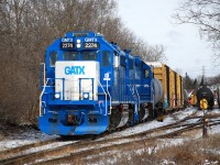 CN L542 with GMTX 2274 and GMTX 2289 switch the small yard at Guelph Jct. on the former Fergus Subdivision.  After completing their switching here they'll head north to the industrial spurs and do some more switching in coordination with the Ontario Southland Railway. 