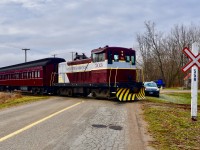 South Simcoe Railway’s Historic GE 70 Ton switcher known as SSR 703 leads the famous Santa Claws Express Train northbound  towards Beeton through the Scenic Beeton Creek Valley near Beeton ON. In this scene they are crossing over a rural crossing known as 7th line, nearing its turn-around point in Beeton and the CP Mactier Sub lies only a few hundred paces to the south! Time was 11:57 <br> Merry Christmas to all! Hope the young children on this train all got what they wanted!! 