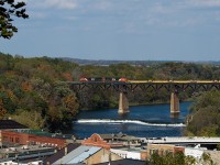 331 crosses the Grand River in Paris on a beautiful Fall afternoon, with a string of new well cars from NSC on the head end. This was a shot I had hoped to do for some time before this, and we'd come here in the hopes of catching 550's power helping 385 along after it stalled going up the hill. However, 385's head end stopped short of Paris Junction and 550 dropped off somewhere between the bridge and Brantford. We'd settle on a nice, bright 331 instead, which followed shortly after.