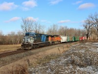 Finally a bit of sun for the area but boy it was cold waiting for this guy. CP 244 had a knuckle failure in Milton blocking both tracks for over an hour as a stood patiently freezing but finally CEFX 1040 with BNSF 5209 made their way westward on their way to London.