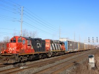 A pair of old "Geeps" have a short train in tow as they head one of the few daily transfer jobs between Oakville and Aldershot yard. These days these are pretty much the only freight traffic one can find running east of Burlington west, especially during the daylight hours.