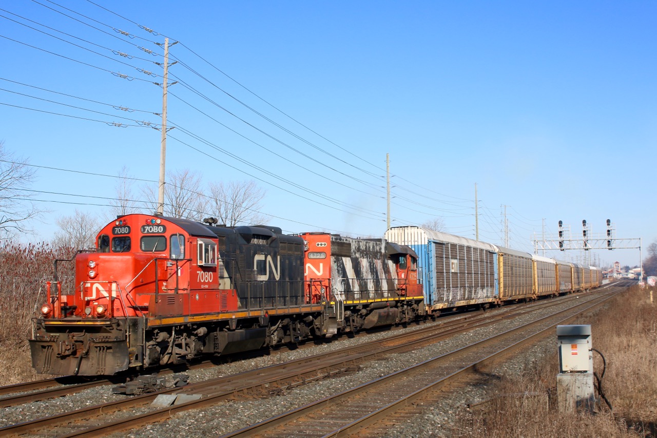 A pair of old "Geeps" have a short train in tow as they head one of the few daily transfer jobs between Oakville and Aldershot yard. These days these are pretty much the only freight traffic one can find running east of Burlington west, especially during the daylight hours.