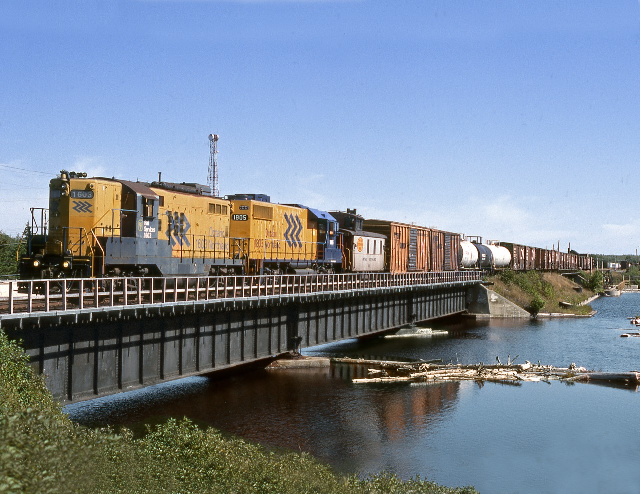 The turn from Cochrane switches west of the station over The dam on the Kapuskasing River which serves the Spruce Falls paper mill, Kapuskasing's reason d'etre