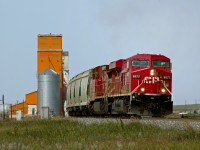 Potash Empties 672 pass the wooden grain elevators at Morse on the run between Swift Current and Moose Jaw