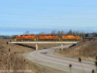 Caledonia is a neat place, but we all tend to focus on the historic stuff such as the bridge and river downtown, but this scene looked nice so I tried to capture it and had success when the Southern Ontario Railway ran on the line in daylight back in April this year. Three RLHH engines, in G&W's best effort of "matching" paint schemes is passing over the Caledonia Bypass of HWY 6 built around 1980.