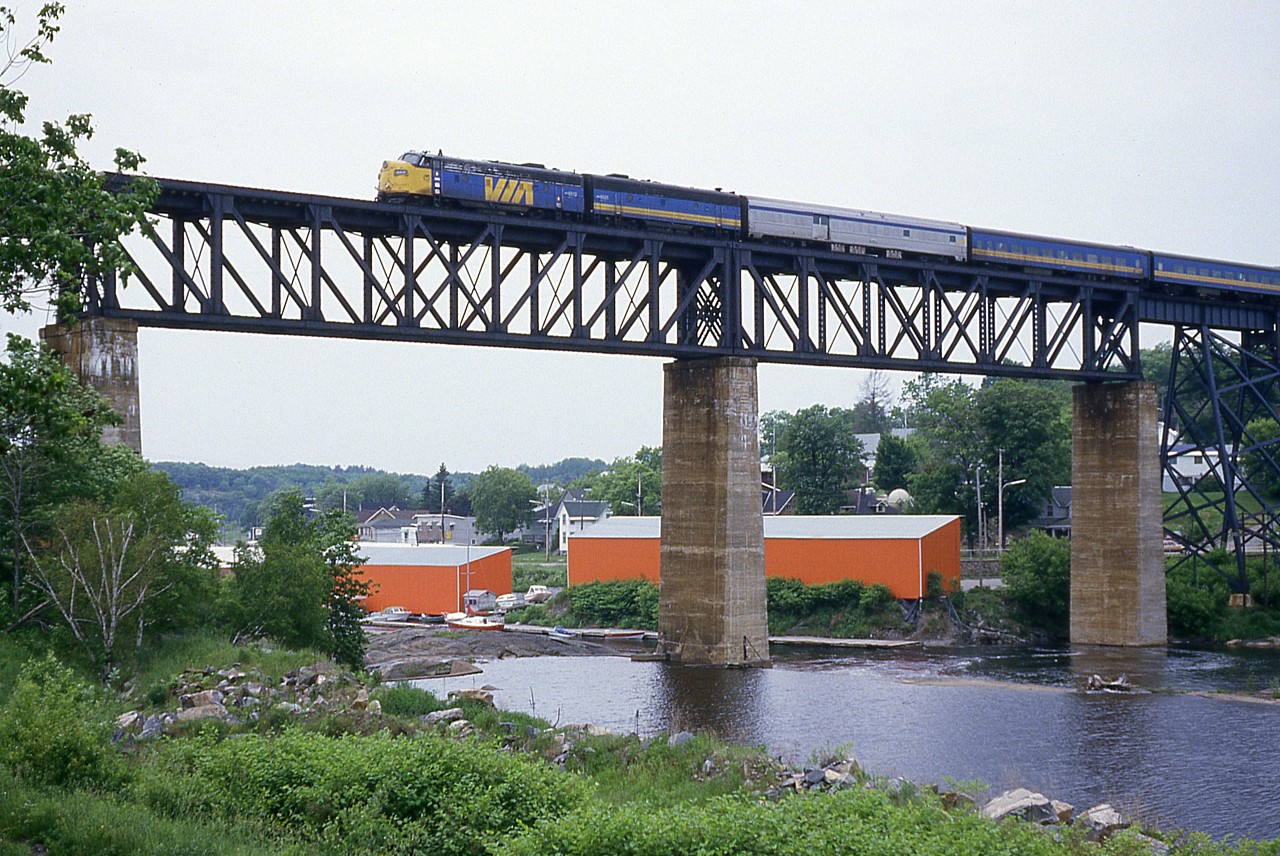 Being a typical day when I am out (dull, cloudy) that gave me at least the opportunity to shoot the southbound Toronto-portion of the 'Canadian' from the opposite side of the Parry Sound trestle that most images are taken from.  Here is VIA 6512 and 6621 on the trestle over the Seguin River. Time is around 1420h. The Trackside Guide indicates the 6512 went to the states as KCS1 and then KCS 2.  So it soldiers on.