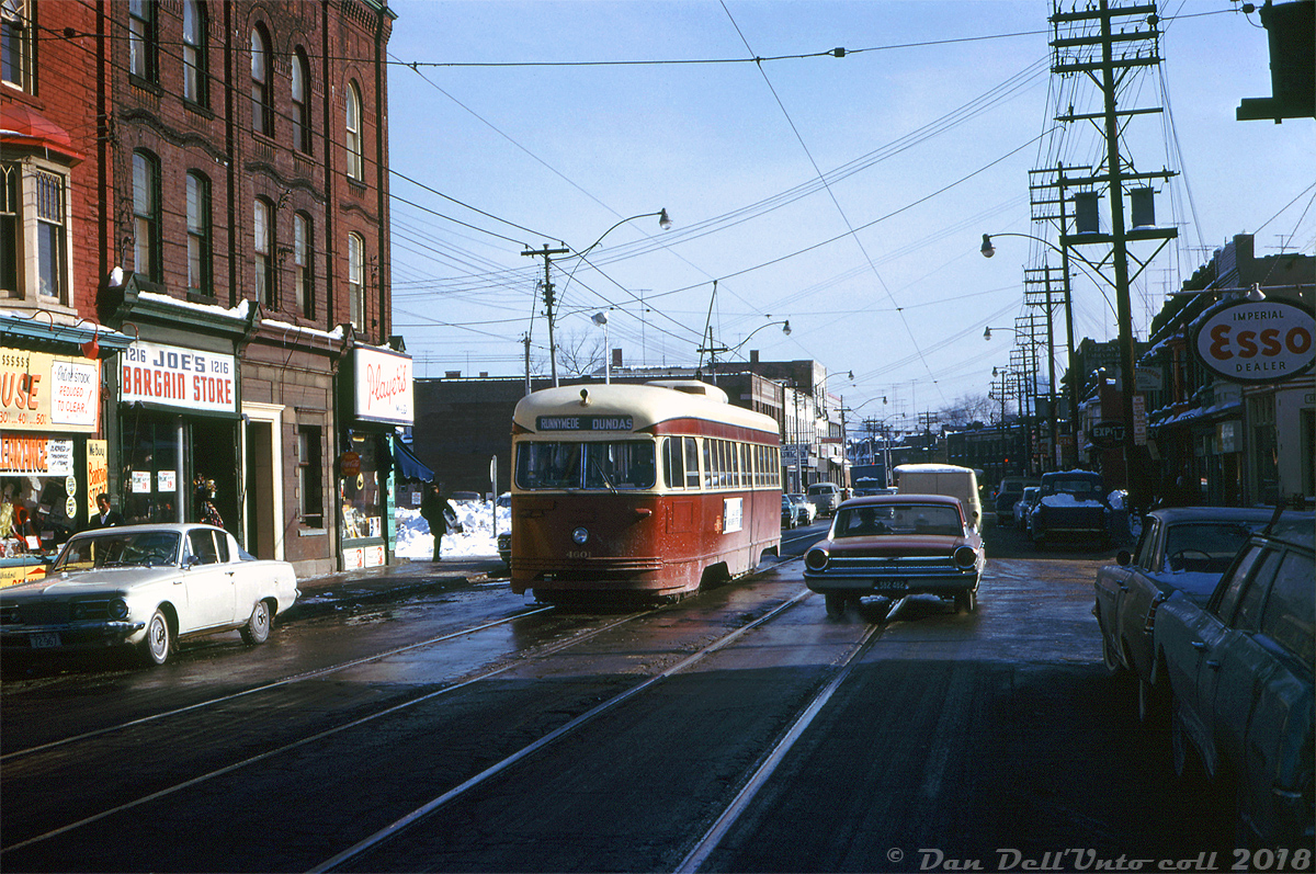 TTC PCC 4601 (an A10-class ex-Cincinnati Street Railway air-electric PCC built by St. Louis Car in 1940) heads westbound on Dundas Street W. near at Grove Ave., passing traffic on a slushy winter's day on the Dundas route bound for Runnymede Loop. The bend in the road at Ossington can be seen in the background.

John F. Bromley photo, Dan Dell'Unto collection slide.