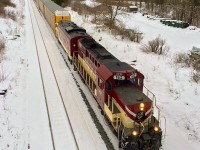 My favourite OSR unit, RS18u #182 is seen here backing into W Coak to retrieve empties to bring back to the Cami plant in Ingersoll. 