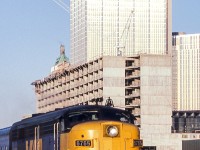 VIA 6765 is eastbound from Toronto Union Station on March 23, 1982.