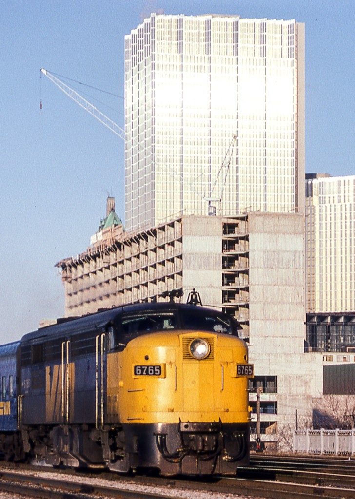 VIA 6765 is eastbound from Toronto Union Station on March 23, 1982.