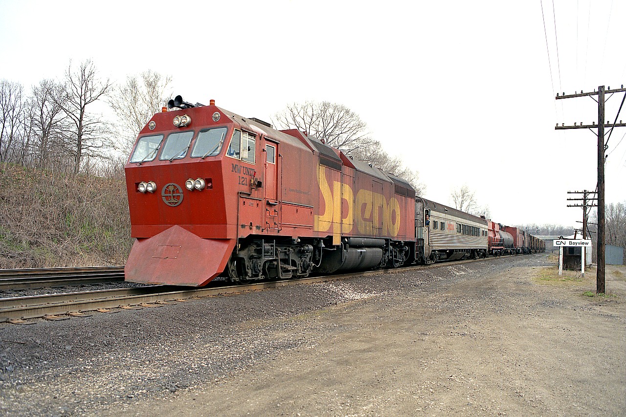 The year after this image of a SPENO rail grinding train was taken; this company, along with Jackson Jordan and Dapco were taken over by Pandrol International to become its' track maintenance division. We eventually noted rail grinding trains under the name Pandrol Jackson. In 1999; Fairmont Tamper and Pandrol Jackson merged to become Harsco Rail Technologies.
My understanding is SPENO rail grinding trains only operated in North America between 1980 and 1990, based out of Syracuse, NY.
Corrections and comments appreciated.

This particular unit appears to be returning to its home base by way of CN Grimsby Sub.