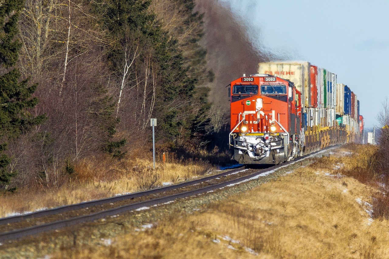 CN 3092 crests the hill as it leads a short stack train through Brookfield