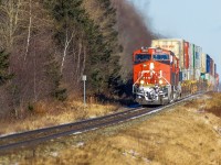 CN 3092 crests the hill as it leads a short stack train through Brookfield 