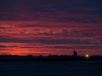 CN 112 rolls through Asquith Saskatchewan under a beautiful sunset.  