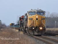 GECX 9557, NS 6803 and CN 2820 are the power on 509 as it heads east out of Sarnia at Telfer Sideroad.