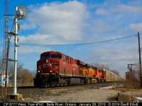 CP 8777 leads train 141 on January 26, 2019 as it blasts through Belle River, Ontario and is about to knock down westbound signal 941.