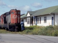 Canadian National 1200 hp NF210s 924 and 928 pull by the station in Lewisporte, Newfoundland on Friday, August 27, 1982.  The units had left Bishops Falls that morning as Extra 928 with a train of empty pulpwood cards and a handful of boxcars for Lewisporte.  At Notre Dame Jct., Mileage 244.5, they set off the pulpwood empties which they would deliver to the loading grounds at Glenwood some nine miles to the east on the Clarenville Subdivision.  In the meantime, the units traversed the 9.4-mile Lewisporte Subdivision.  Upon arrival they wyed their train and proceeded to switch the docks where CN Marine's PETITE FORTE, the KLOSTER and the MARINE TRADER were loading for various outports.  The Lewisporte Sub boomed from the late 1930s through the 1960s as the inbound port for materials and aviation fuel that was shipped to the nearby Gander airport.  Previously Lewisporte had served as a staging area for the construction of the paper mill in Windsor from 1906 through 1909. Light, 50 lb rail required the used of 2-8-0s until the CNR relaid the line with 70 lb rail after 1949.  As traffic dwindled in the late 1970s the line was downgraded to a spur with intermittent traffic until it was abandoned in 1987.  Formerly the line hosted weekday Trains 909 and 910 from Bishops Falls.  Unit 924 became the last unit to run in Newfoundland with engineer Brendan Dicks at the throttle when it was placed on display in Bishops Falls on Wednesday, November 21, 1990.  NF 928 went to Nicaragua and later Chile for further operation.  NF110 902 is displayed in Lewisporte.  For further views of Lewisporte and throughout "The Rock" please contact me at bill.linley@gmail.com about my forthcoming MOrning Sun book: "Trackside Newfoundland,"    