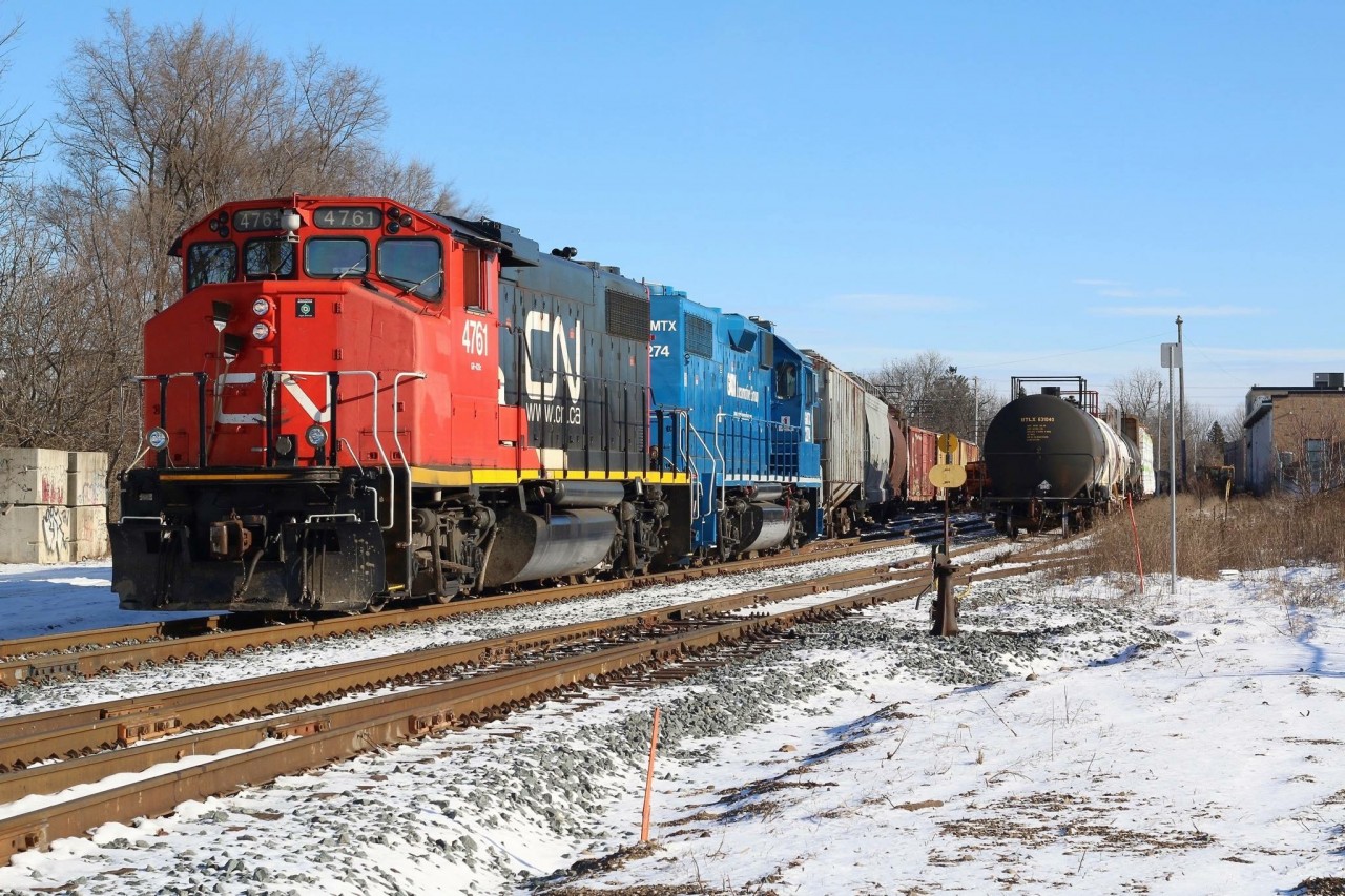 CN 542 with a clean pair of GP38’s has backed onto the Guelph Subdivision to retrieve a few cars before running around the wye and heading up the Guelph North spur to work industries off of the south spur. Before the end of the afternoon the train will once again retrace it’s steps back to Preston, where it will tie up for the weekend.