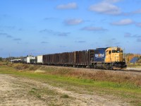 2200 leads the tri-weekly train from Hearst into Kapuskasing.  It is pictured here on the western outskirts of Kapuskasing beside the town's airstrip.