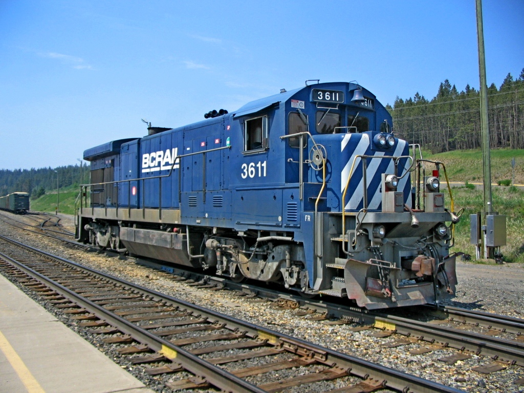 Taking a break at Exeter while switching the yard there. Ex ATSF 7494 looking sharp in BC Rail blue.