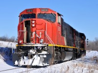 CN 5610 - CN 9543 on L58031 31 head back to the mainline after dropping a single loaded hopper at the Ingenia interchange spot underneath the Hagersville Sub