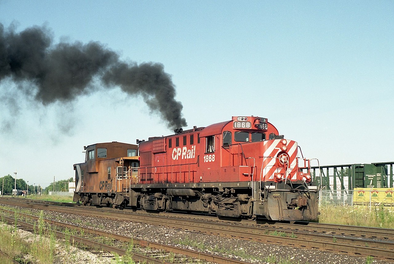 CP 1868 purposely sends up a whiff of alco smoke for the photographer before beginning the day working local traffic brought down from Guelph. This unit in later years went to toil for the New Brunswick East Coast Rwy, until the NBEC takeover by CN in 2008.