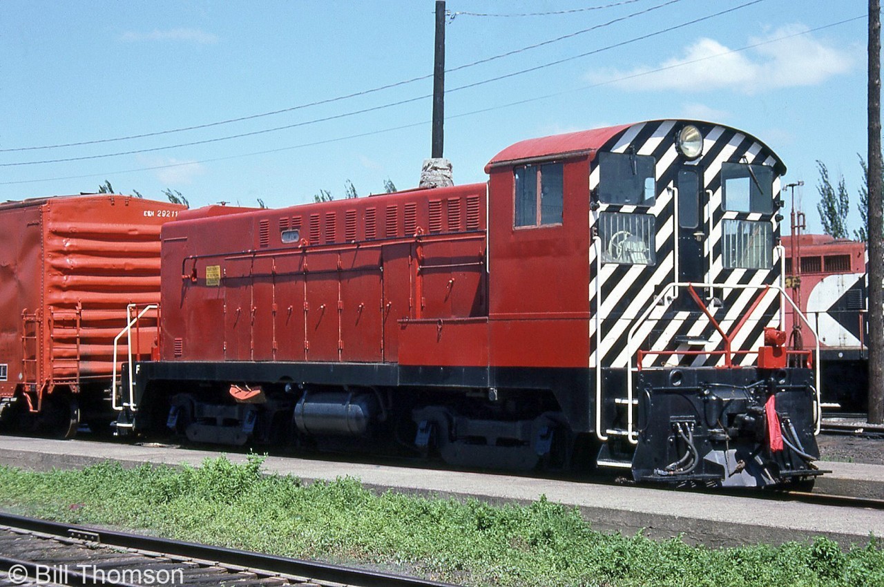 Former CP 7069 (a Baldwin DS4-4-1000) is shown at CP's West Toronto yard on June 2nd 1986. It was originally part of an 11-unit order of Baldwin switchers (7065-7075) and 13-unit order for roadswitchers (8000-8012) built in 1948 by Baldwin in Eddystone PA (the order was set up for CP via CLC) for dieselizing the E&N, and proved to be CP's only Baldwin purchase. The Baldwin fleet served mainly out west on the E&N and in the Vancouver area until the remaining units were retired during the mid-late 1970's.

7069 was retired in October 1978, and purchased later that month by a D.A. Lister of Toronto. It currently resides at the Toronto Railway Heritage Association's "Roundhouse Park" (former CPR John St. Roundhouse) in downtown Toronto, albeit still privately owned and not officially part of the museum's collection.

The only other surviving CP Baldwin locomotive was DRS4-4-1000 8000, which was set aside by CP for their old locomotive collection in the 80's, but eventually donated to the West Coast Railway Association in Squamish BC.