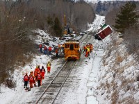 Yesterday, CP 119 hit the ground around mile 184.5 of the Belleville Subdivision. For those of you not familiar with the area, this is located in Ajax, ON between Westney Rd. and Church St, looking to the west.

Crews have been working around the clock to clean up the aftermath of a decent-sized derailment. I drove around the area and could not believe the amount of trucks and workers on the scene. It truly is amazing to see how quick and effective these guys can be during the clean up process!