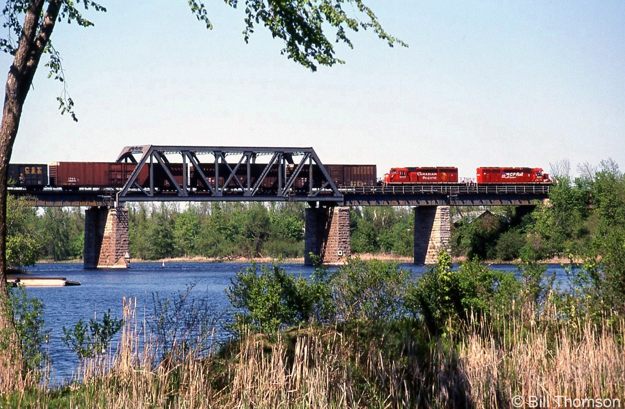 An eastbound CP freight lead by two SD40-2's crosses over the Rideau Canal, at Merrickville in May 1999.