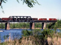An eastbound CP freight lead by two SD40-2's crosses over the Rideau Canal, at Merrickville in May 1999.