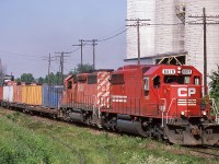 CP 6619 is seen here in it's short lived patch job leading 158 past Reid milling and the ADM spur at mile 20 of the Galt Sub. 
