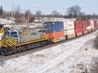 A detouring intermodal train rounds the curve at Garden Ave with CREX 1524 on the point.